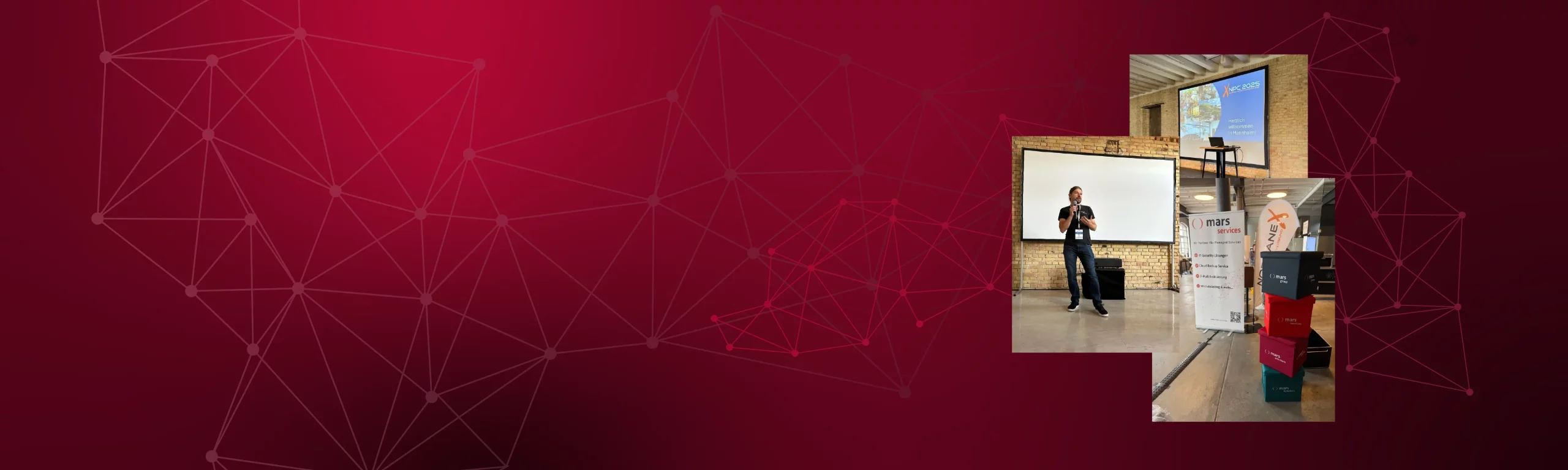 Ein Redner steht auf einer Bühne während einer Präsentation vor einem großen Bildschirm.